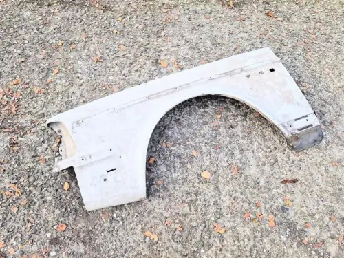 Spatbord links Volvo 240 1315424